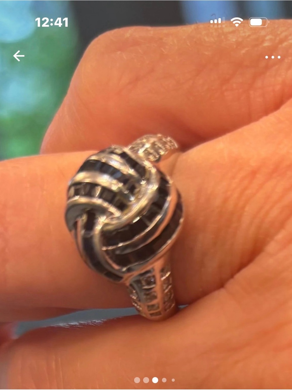 14k  white gold Knot Ring with sapphire baguettes and diamond accents
